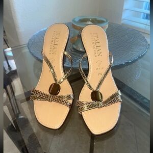 Italian shoemakers snake print wedge sandals